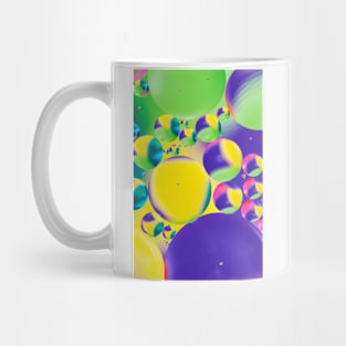 Colorful close up of oil drops in water Mug